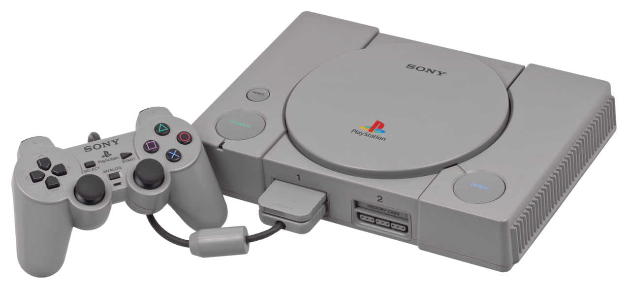 Sony PlayStation SCPH-5001 con DualShock e memory card; il controller è successivo al lancio